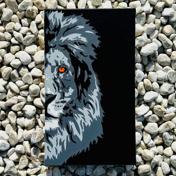 Interprétation pop art d'un lion, mêlant noir, blanc et éclat d'orange dans l'œil.